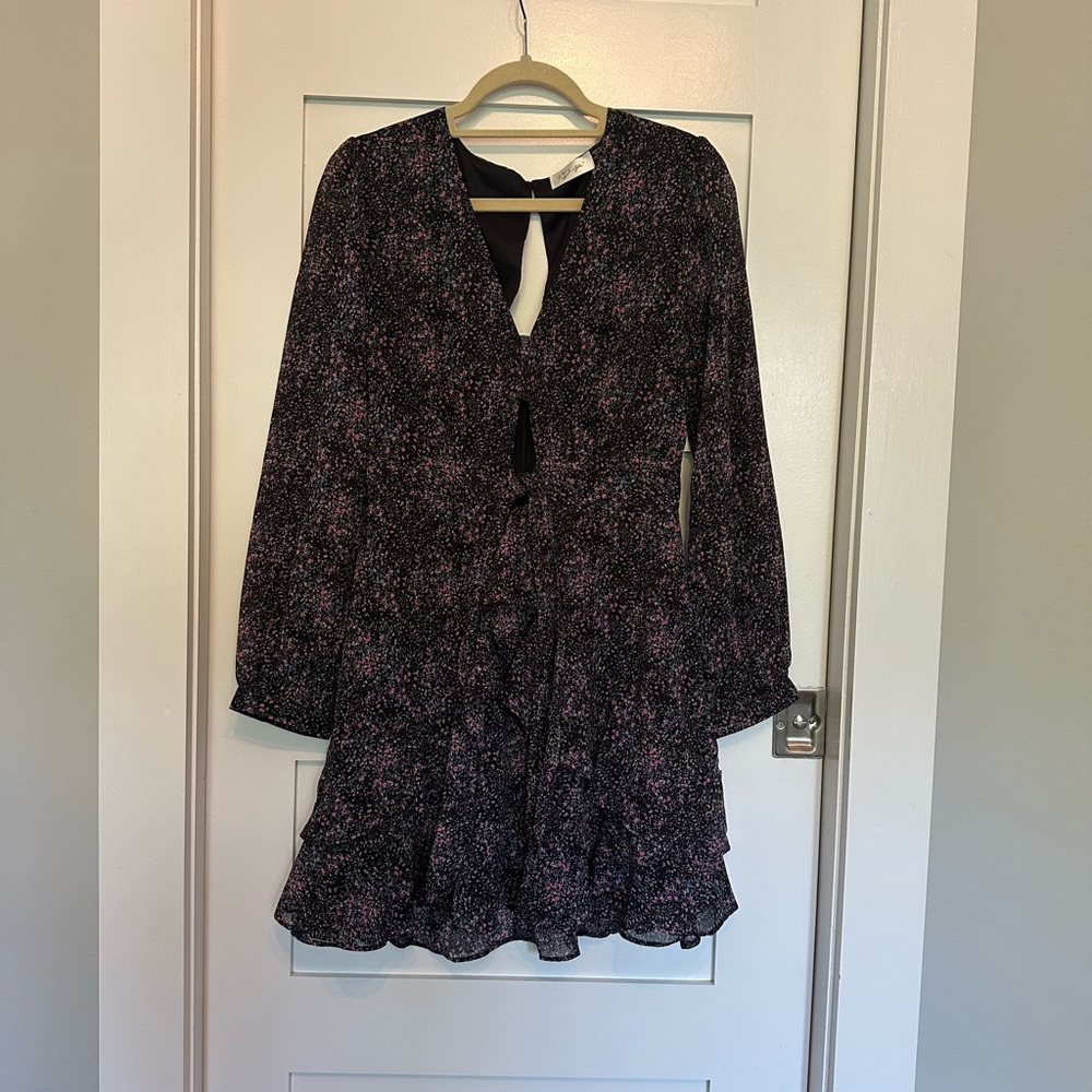 Ruffles and chiffon dress with cut-out and bow
